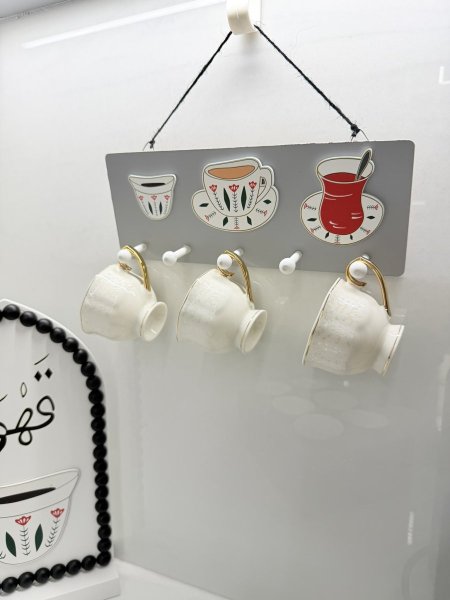 علاقة خشب شكل فناجين قهوة